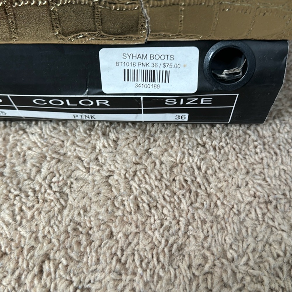 Knee length pink boots